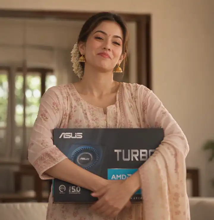Sanvii holding an ASUS TUF graphics card for an ASUS campaign
